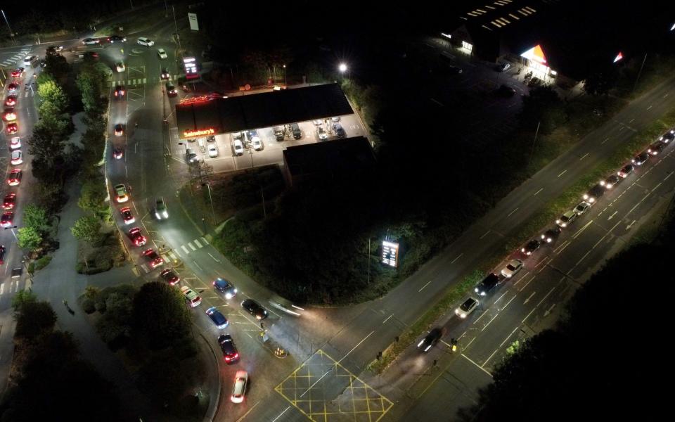 Drivers queued up long into the night in petrol stations across Britain - Gareth Fuller/PA Wire