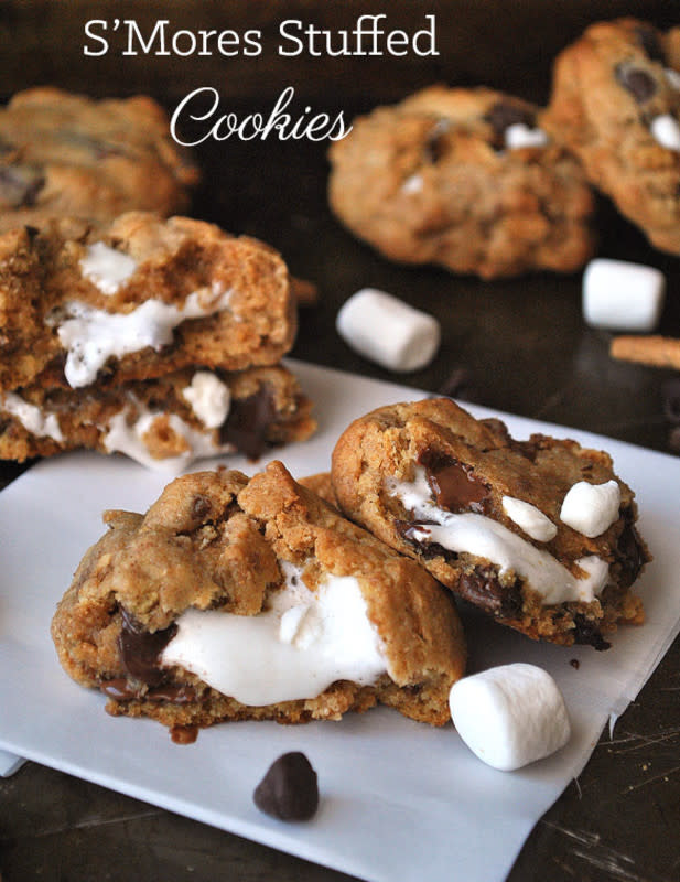 <p>cookienameddesire.com</p><p>Your favorite campfire treat gets an upgrade with this gooey, cookie recipe. S’mores stuffed cookies are filled with graham crackers and chocolate, then stuffed with gooey marshmallows for the ultimate s’mores dessert. </p><p><strong>Get the recipe: </strong><a href="http://cookienameddesire.com/smores-stuffed-cookies/" rel="nofollow noopener" target="_blank" data-ylk="slk:S’mores Stuffed Cookies;elm:context_link;itc:0;sec:content-canvas" class="link "><strong>S’mores Stuffed Cookies</strong></a></p><p><strong>Related: <a href="https://www.yahoo.com/lifestyle/ooey-gooey-mores-much-less-150000664.html" data-ylk="slk:How to Make Foil Packet S'mores;elm:context_link;itc:0;sec:content-canvas;outcm:mb_qualified_link;_E:mb_qualified_link;ct:story;" class="link  yahoo-link">How to Make Foil Packet S'mores</a></strong></p>