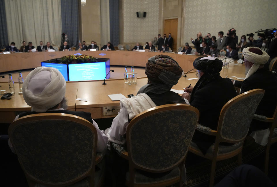 Members of the political delegation from the Afghan Taliban's movement attend talks involving Afghan representatives in Moscow, Russia, Wednesday, Oct. 20, 2021. Russia invited the Taliban and other Afghan parties for talks voicing hope they will help encourage discussions and tackle Afghanistan's challenges. (AP Photo/Alexander Zemlianichenko, Pool)