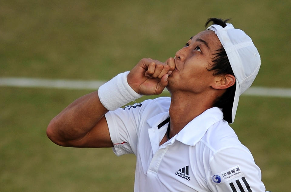 Lu Yen-Hsun of Taiwan celebrates after beating Andy Roddick of US 4-6, 7-6, (7/3) 7-6, (7/4) 6-7, (5/7) 9-7, during the Wimbledon Tennis Championships at the All England Tennis Club, in south-west London, on June 28, 2010. AFP PHOTO/ADRIAN DENNIS (Photo credit should read ADRIAN DENNIS/AFP via Getty Images)