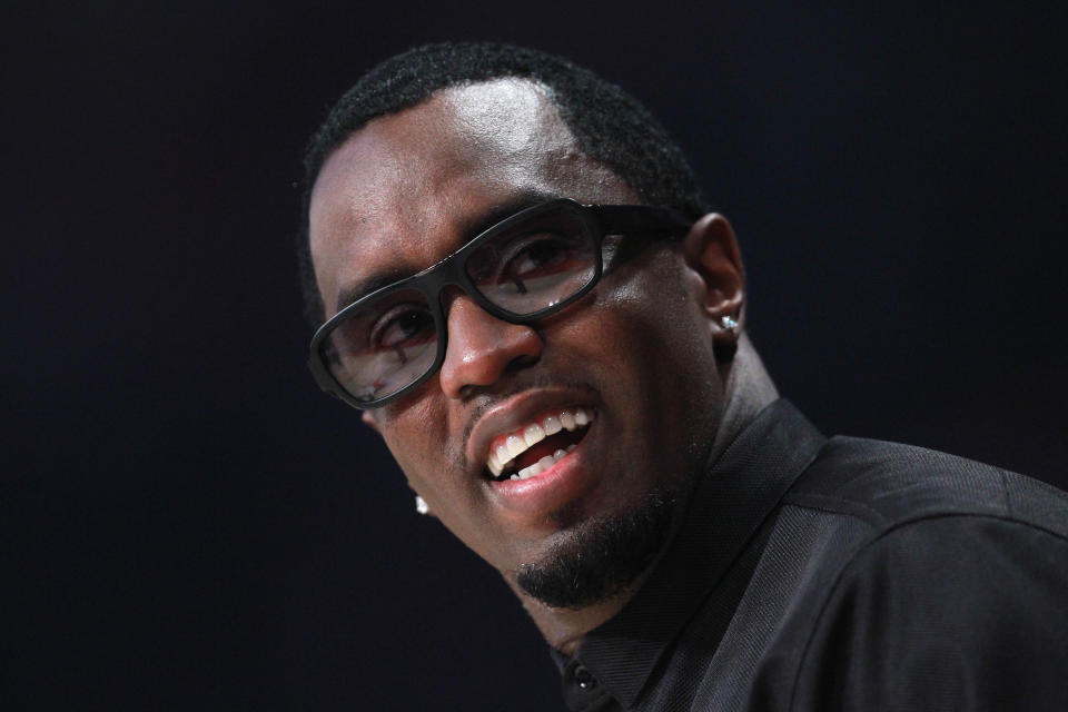 HOUSTON, TX - FEBRUARY 17:  Sean 'Diddy' Combs smiles during the 2013 NBA All-Star game at the Toyota Center on February 17, 2013 in Houston, Texas. NOTE TO USER: User expressly acknowledges and agrees that, by downloading and or using this photograph, User is consenting to the terms and conditions of the Getty Images License Agreement.  (Photo by Ronald Martinez/Getty Images)