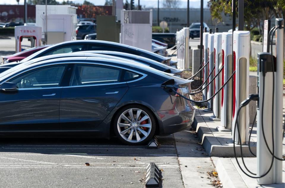 Tesla Supercharger and ChargePoint EV charging station on Sisk Road in Modesto, Calif.,Thursday, Jan. 11, 2024.