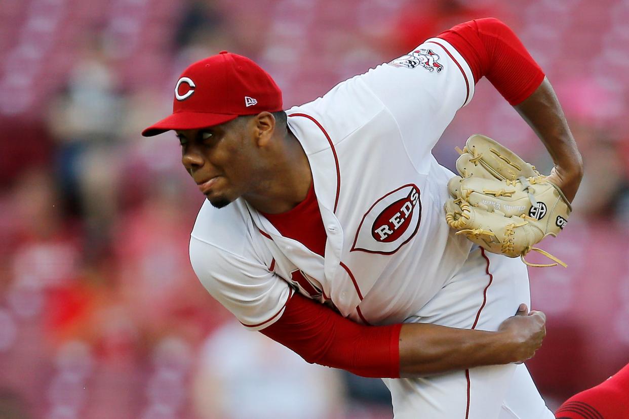 Cincinnati Reds starting pitcher Hunter Greene (21) throws a pitch in the second inning of the MLB National League game between the Cincinnati Reds and the Miami Marlins at Great American Ball Park in downtown Cincinnati on Tuesday, July 26, 2022.