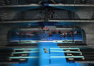 <p>Ukraine's Anna Pysmenska competes in the preliminary round of the women's 3m springboard diving event at the Tokyo Aquatics Centre.</p>