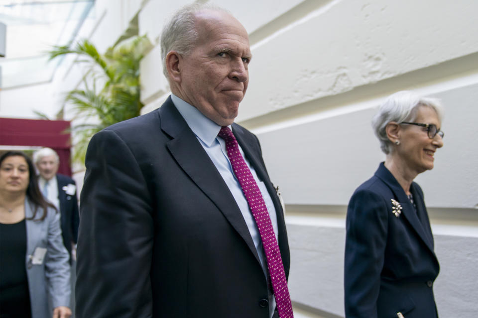 Former CIA Director John Brennan, left, and Wendy Sherman, right, a former State Department official and top negotiator of the Iran nuclear deal, arrive to meet with Speaker of the House Nancy Pelosi, D-Calif., about the situation in Iran, at the Capitol in Washington, Tuesday, May 21, 2019. (AP Photo/J. Scott Applewhite)