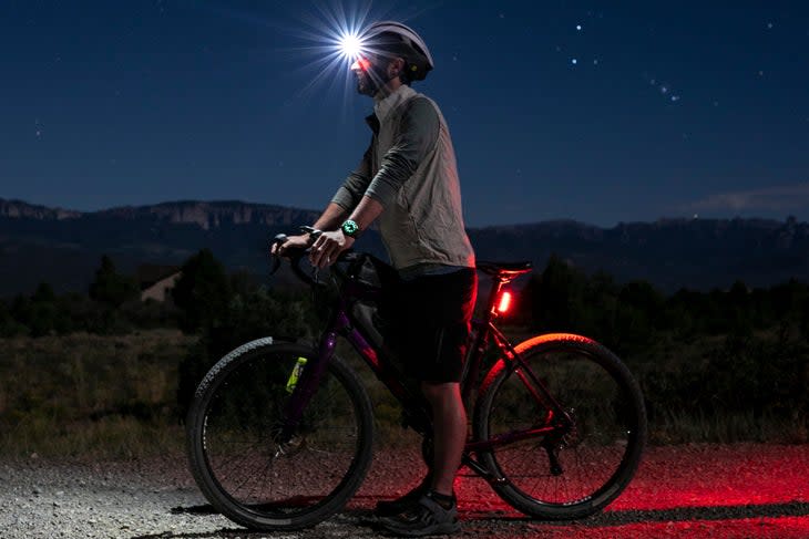 man going for a bike ride at night