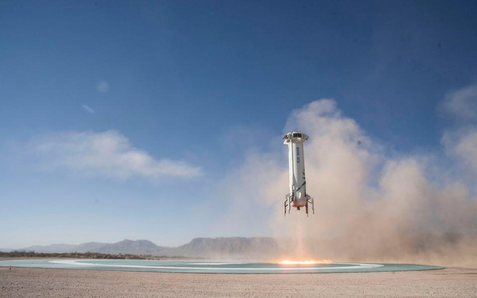 A New Shepard booster landing on a pad in West Texas during development - Blue Origin/Mega