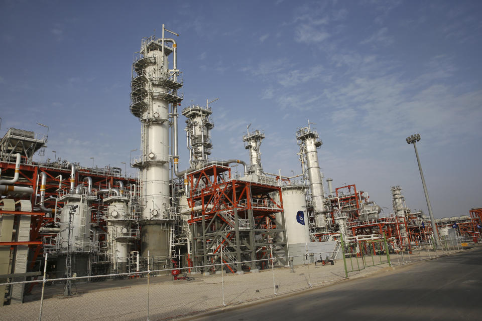 This Saturday, March 16, 2019 photo, shows a natural gas refinery at the South Pars gas field on the northern coast of the Persian Gulf, in Asaluyeh, Iran. Iran's President Hassan Rouhani on Sunday inaugurated a new phase in the development of the South Pars natural gas field. Iran says the development will allow Iran to overtake Qatar in the production of natural gas. The two countries are among the biggest gas producers in the world, and share the South Pars gas field. (AP Photo/Vahid Salemi)