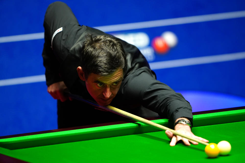 England's Ronnie O'Sullivan in action against England's Judd Trump during day sixteen of the Betfred World Snooker Championship at The Crucible, Sheffield. Picture date: Sunday May 1, 2022.