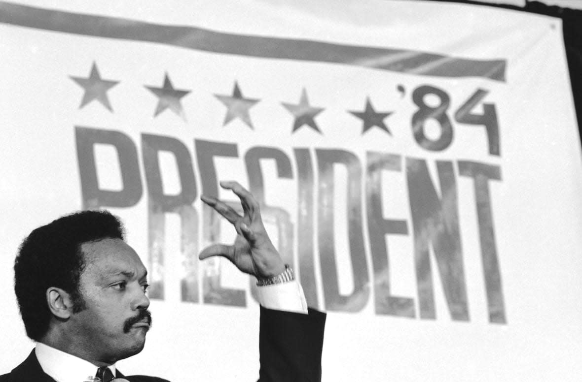 FILE – Rev. Jesse Jackson addresses supporters in Washington, Thursday, Nov. 3, 1983, after he announced he would seek the Democratic presidential nomination. Jackson plans to step down from leading the Chicago civil rights organization Rainbow PUSH Coalition he founded in 1971, his son’s congressional office said Friday, July 14, 2023. (AP Photo/Ira Schwarz, File)