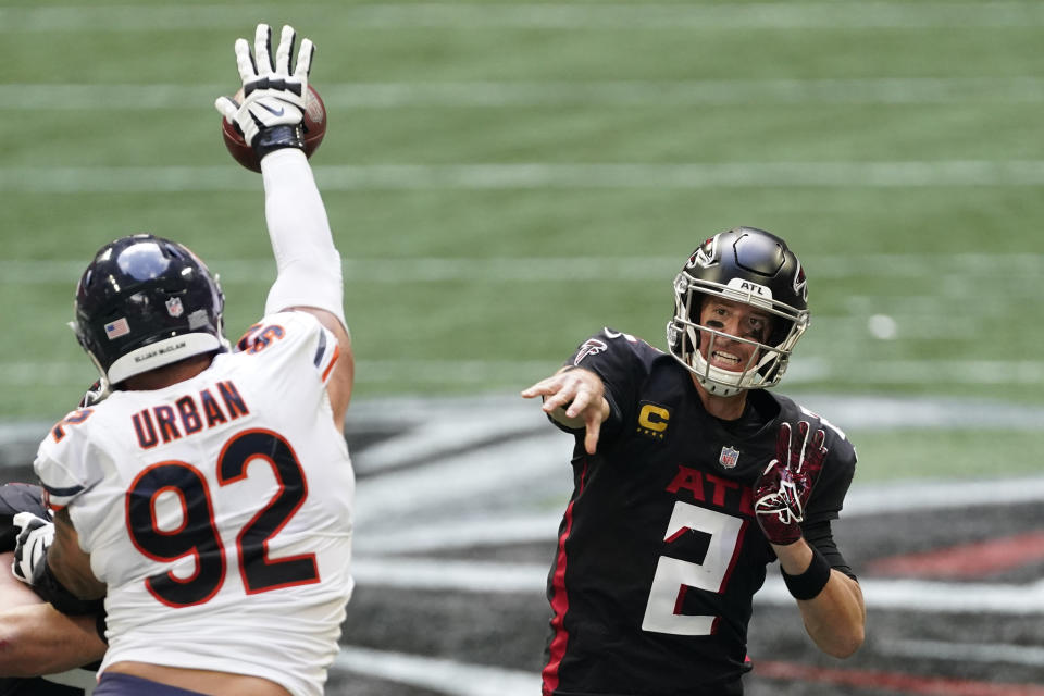 Chicago Bears defensive end Brent Urban (92) deflects a Atlanta Falcons quarterback Matt Ryan pass during the second half of an NFL football game, Sunday, Sept. 27, 2020, in Atlanta. (AP Photo/John Bazemore)