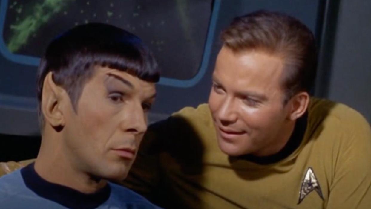  Spock and Kirk talking. 