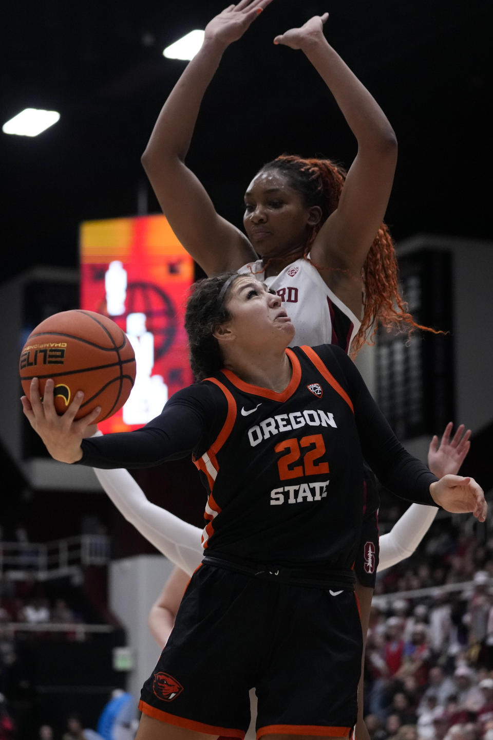 Oregon State guard Talia von Oelhoffen (22) shoots while defended by Stanford forward Kiki Iriafen, top, during the first half of an NCAA college basketball game, Sunday, Jan. 21, 2024, in Stanford, Calif. (AP Photo/Godofredo A. Vásquez)