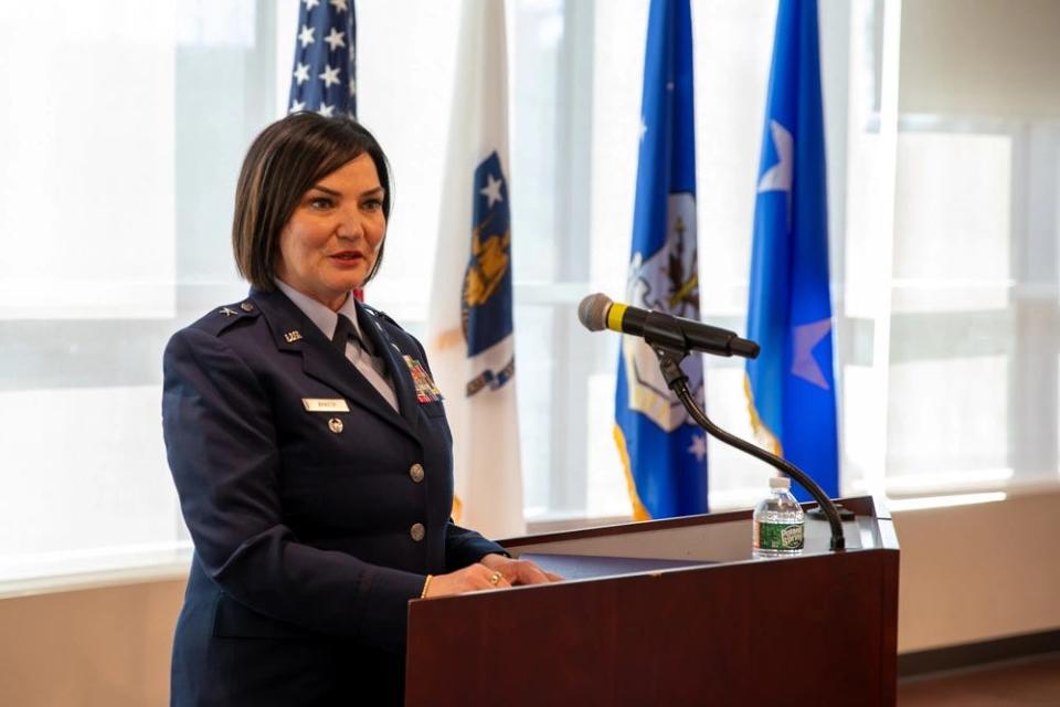 Newly promoted Brig. Gen. Lisa Ahaesy speaks during her promotion ceremony at the Massachusetts National Guard Joint Forces Headquarters, Hanscom Air Force Base, on Dec.12, 2023.