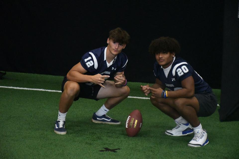 Chambersburg's Riley Harmon (12) and Dayre Senft (20) take part in Mid-Penn Media Day at Cumberland Valley High School on Wednesday, August 2, 2023