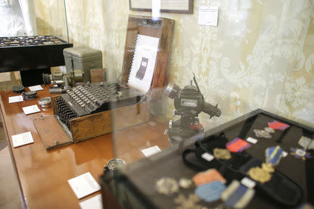 An Enigma cipher machine is on display among other wartime memorabilia pieces at an auction house in Bucharest, Romania, July 11, 2017. Inquam Photos/Octav Ganea/via REUTERS