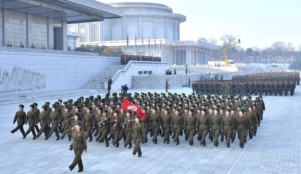 North Korean People's Army soldiers take part in a rally to swear allegiance to North Korean leader Kim Jong Un ahead of the second death anniversary of former leader Kim Jong Il at the Kumsusan Palace of the Sun