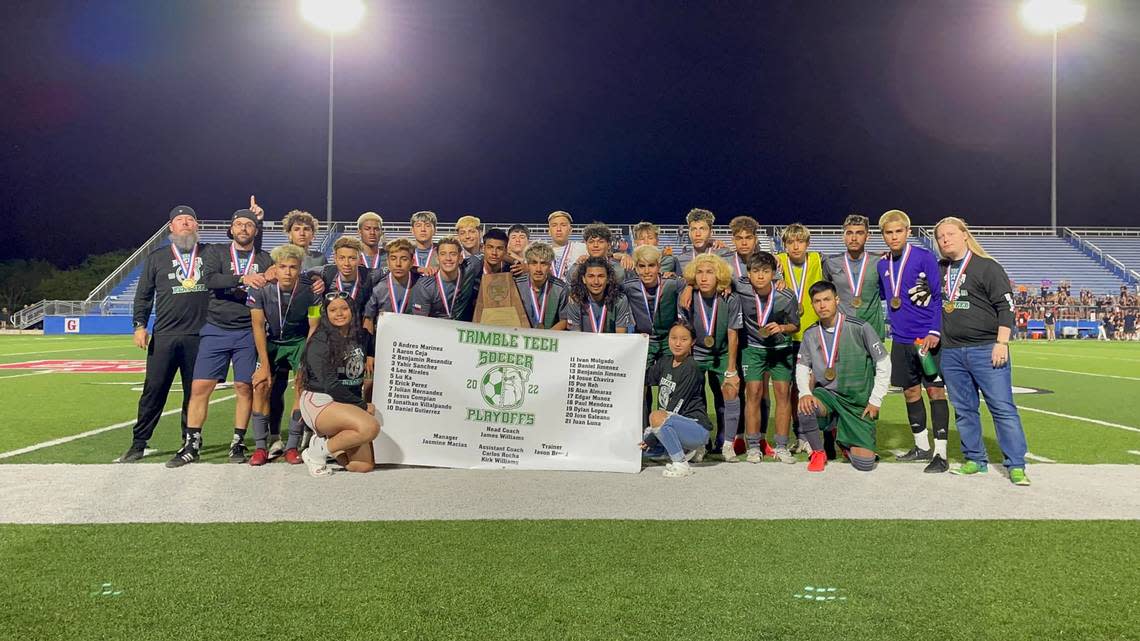 Trimble Tech poses with the state semifinals trophy after its 5A game with Wakeland on Thursday April 14, 2022.