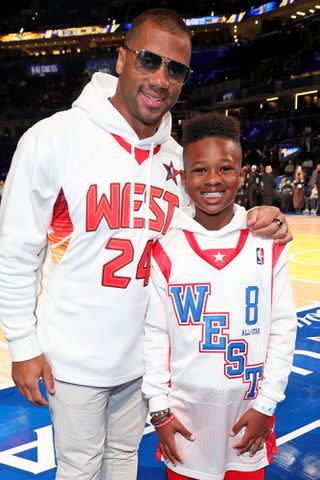 <p>Kevin Mazur/Getty</p> Russell Wilson and Future Zahir