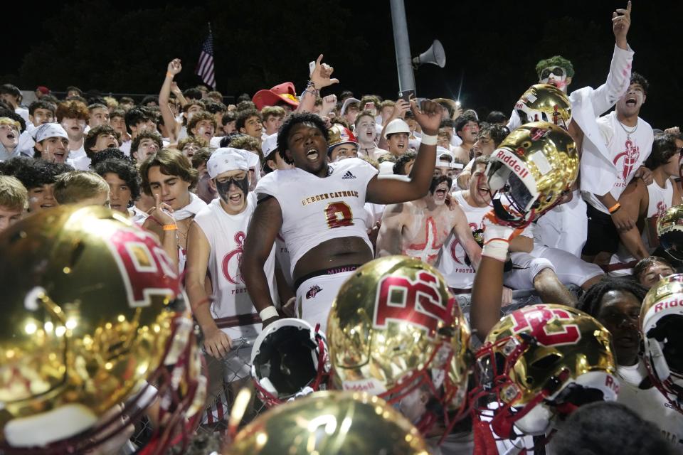 Ramsey, NJ-- September 23, 2023 -- Elijah Kinsler celebrates with his team and class mates after Bergen Catholic defeated Don Bosco 38-15 in their football rivalry played at Don Bosco in Ramsey on September 23, 2023.