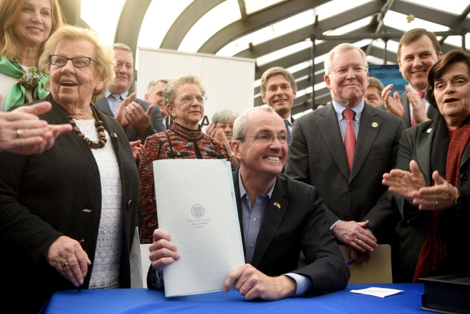 Gov. Phil Murphy signed legislation to reform NJ Transit's governance and management to improve service and reliability for NJ commuters at the Summit Train Station on Thursday, December 20, 2018.