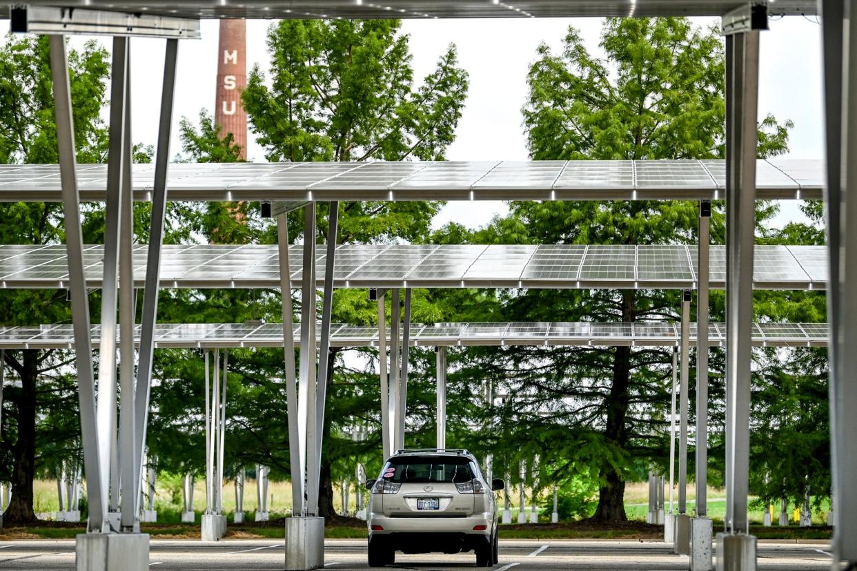 A car is parked in the Michigan State University solar parking lot on Mt. Hope Road on Wednesday, Aug. 2, 2023, on the MSU campus in East Lansing.