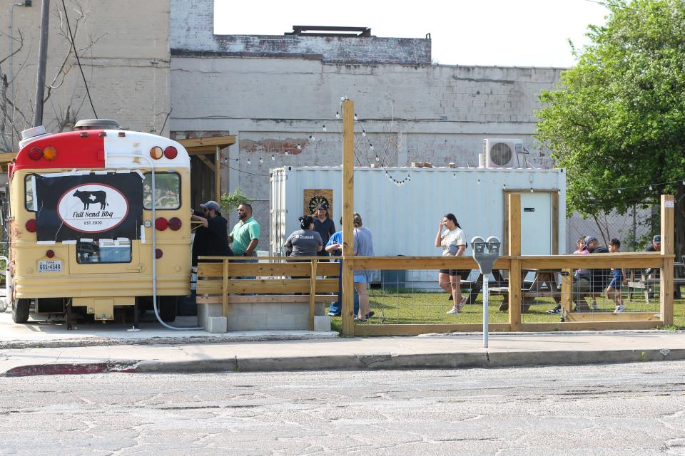 Customers wait in line at Full Send Barbecue in downtown Corpus Christi Friday, March 15, 2024.