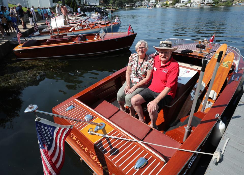 Ginger Long, 81, and Bud Long, 84, sit on their 1959 boat First Date at the Portage Lakes Antique & Classic Boat Show. They went on their first date on the boat in 1962. They have been married for 56 years.