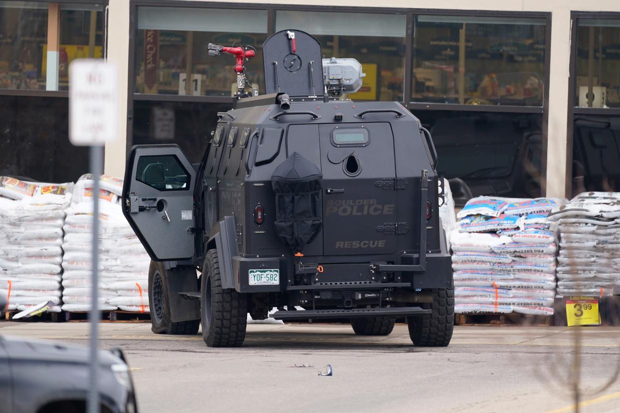 Police work on the scene outside of a King Soopers grocery store where a shooting took place Monday, March 22, 2021, in Boulder, Colo.