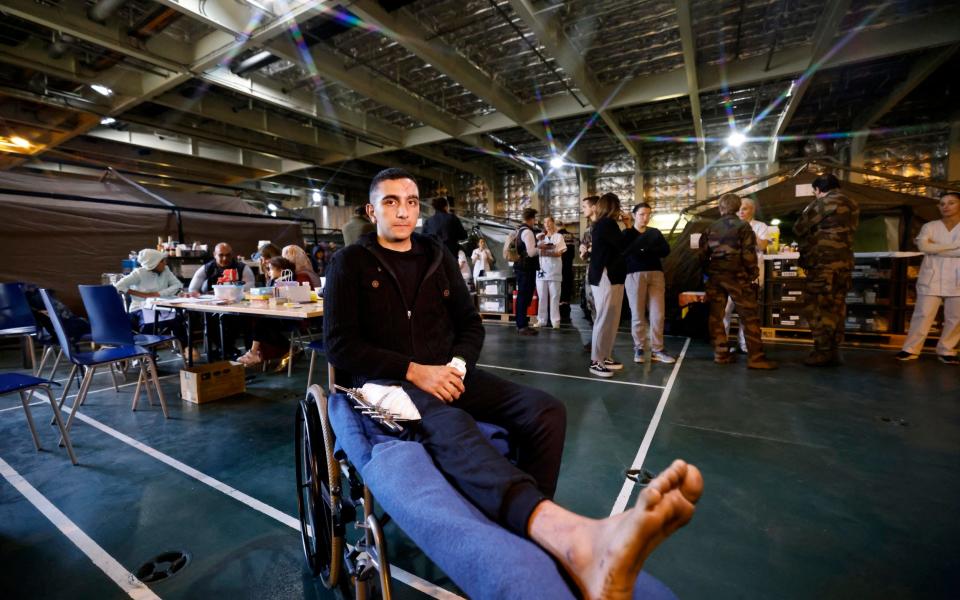 A wounded Palestinian man onboard the French LHD Dixmude military ship which serves as a hospital