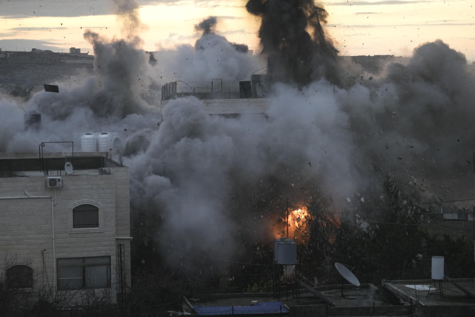 Israeli troops demolish the house of Palestinian Muhammed Kamel al-Jabari, who carried out a deadly shooting attack last year that killed one Israeli, in the West Bank city of Hebron, Thursday, Feb. 16, 2023. (AP Photo/Mahmoud Illean)