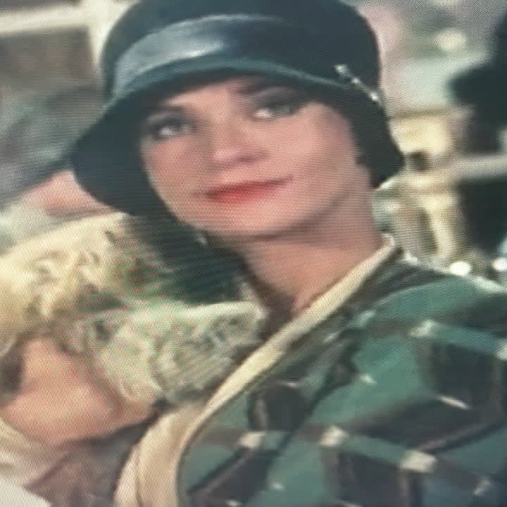 Diana Quick as Julia wearing a green patterned dress in Brideshead Revisited