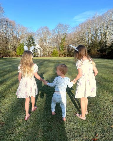<p>Nicky Hilton/Instagram</p> Nicky Hilton's three kids holding hands during Easter festivities.