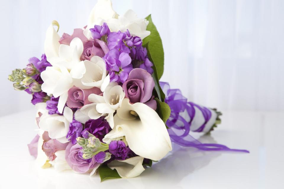 purple and white bridal bouquet