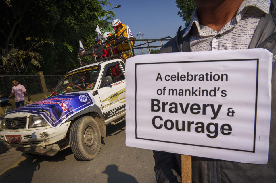 People from the mountaineering community, Sherpa guides and officials participate in a rally to mark the 70 anniversary of the first ascent of Mount Everest in Kathmandu, Nepal, Monday, May 29, 2023. The 8,849-meter (29,032-foot) mountain peak was first scaled by New Zealander Edmund Hillary and his Sherpa guide Tenzing Norgay on May 29, 1953. (AP Photo/Niranjan Shrestha)