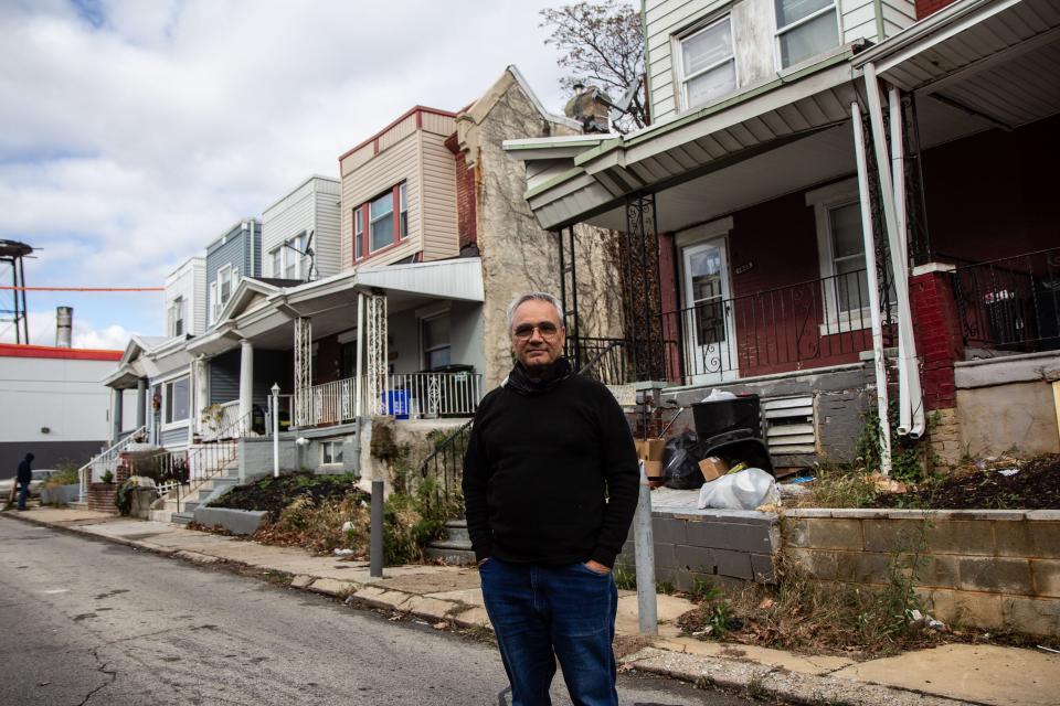 Moshe Attas in front of his property on Airdrie Street in Philadelphia. After getting involved in the city's landmark eviction diversion program, Attas said he thinks "this system should replace the tenant-landlord court."