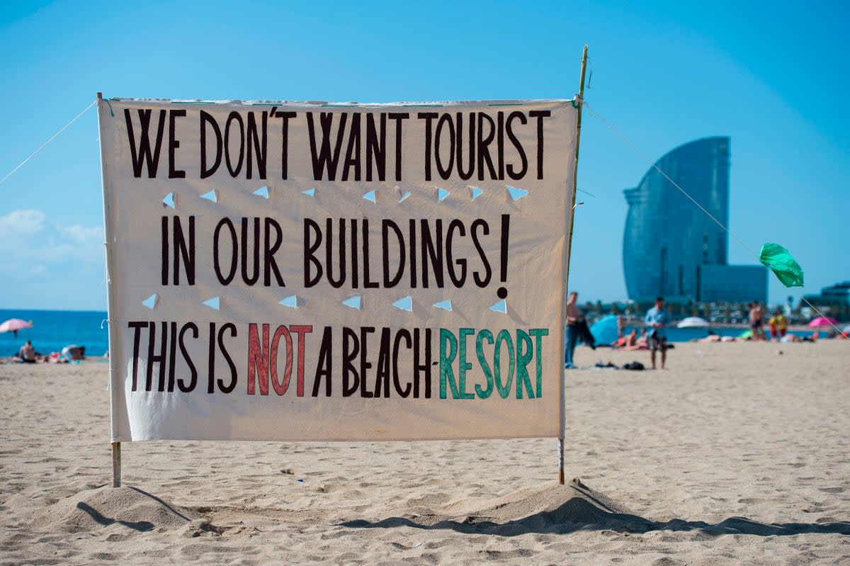 Anti-tourism banners in Barcelona in 2017 (AFP via Getty Images)