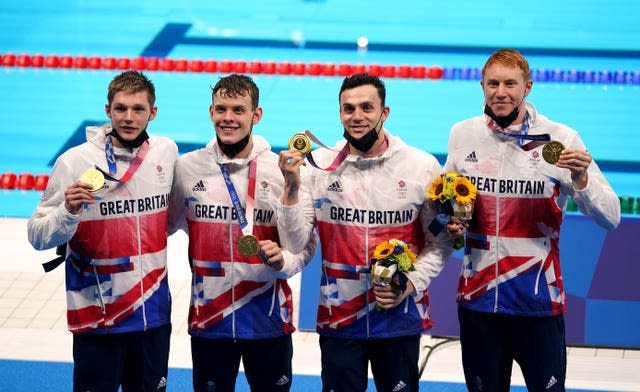 Duncan Scott, Tom Dean, Matthew Richards and James Guy with their medals