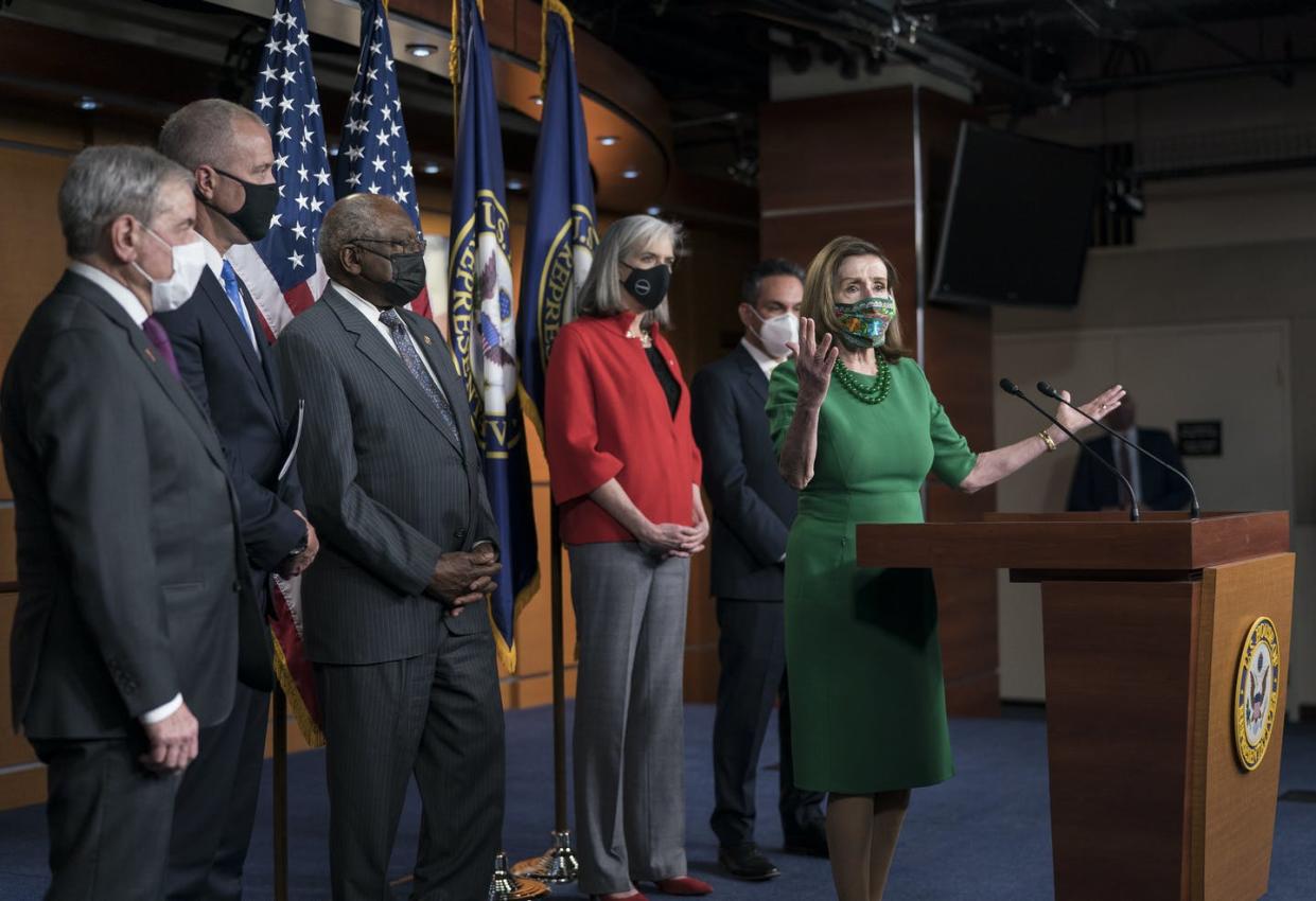 <span class="caption">Speaker of the House Nancy Pelosi and other top Democrats meet with reporters before the House voted to pass a $1.9 trillion pandemic relief package on Feb. 26, 2021. </span> <span class="attribution"><a class="link " href="https://newsroom.ap.org/detail/VirusOutbreakCongress/55e0725a5fff4da999dc8483350d1976/photo?Query=Congress%20AND%20voting&mediaType=photo&sortBy=arrivaldatetime:desc&dateRange=Anytime&totalCount=8044&currentItemNo=3" rel="nofollow noopener" target="_blank" data-ylk="slk:AP Photo/J. Scott Applewhite;elm:context_link;itc:0;sec:content-canvas">AP Photo/J. Scott Applewhite</a></span>