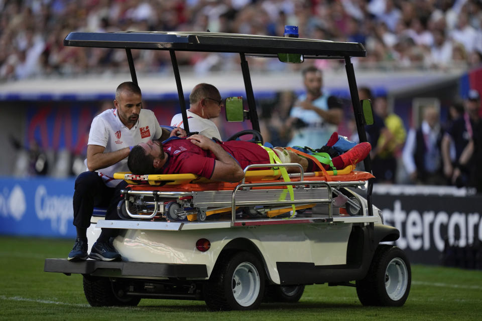 Georgia's Lasha Jaiani is taken off the field on a stretcher after getting injured during the Rugby World Cup Pool C match between Fiji and Georgia at the Stade de Bordeaux in Bordeaux, France, Saturday, Sept. 30, 2023. (AP Photo/Thibault Camus)