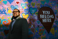 Ricky Hurtado, a Democratic candidate for the North Carolina state house, poses for a portrait by a mural in Graham, N.C., Tuesday, March 10, 2020. He is the first Latino candidate to run for North Carolina's House of Representatives. (AP Photo/Jacquelyn Martin)