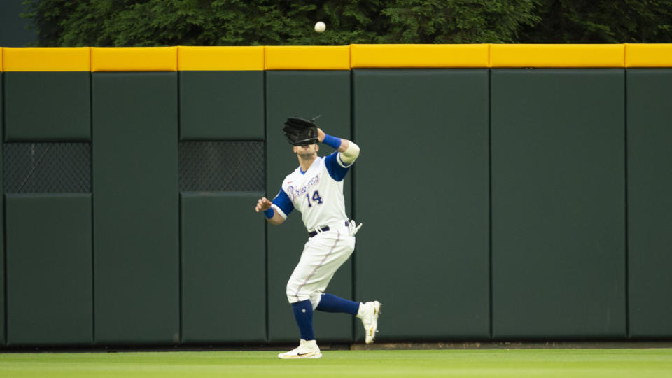 Atlanta Braves right fielder Adam Duvall (14) catches pop fly during the second inning of a baseball game against the Milwaukee Brewers, Saturday, May 7, 2022, in Atlanta. (AP Photo/Hakim Wright Sr)