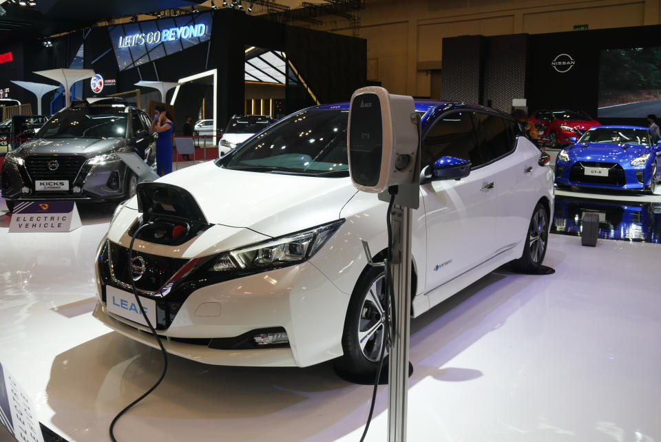 TANGERANG, INDONESIA - NOVEMBER 12: Nissan Leaf electric car displayed during the GAIKINDO Indonesia International Auto Show (GIIAS) at Indonesia Convention Exhibition on the outskirt of Jakarta, Tangerang, Indonesia on November 12, 2021. This first auto exhibition during pandemic COVID-19 organized by the Association of Indonesian Automotive Industries GAIKINDO open for the public from 12 to 21 November and joined by more than 300 brands in the supporting industries and highlighted around 150 new vehicles. (Photo by Anton Raharjo/Anadolu Agency via Getty Images)