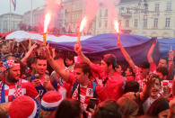 <p>Soccer Football – World Cup – Final – France v Croatia – Zagreb, Croatia – July 15, 2018 – Croatia’s fans are seen before the broadcast of the match at the city’s main square. REUTERS/Marko Djurica </p>