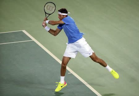 2016 Rio Olympics - Tennis - Final - Men's Singles Gold Medal Match - Olympic Tennis Centre - Rio de Janeiro, Brazil - 14/08/2016. Juan Martin Del Potro (ARG) of Argentina in action against Andy Murray (GBR) of Britain. REUTERS/Kevin Lamarque