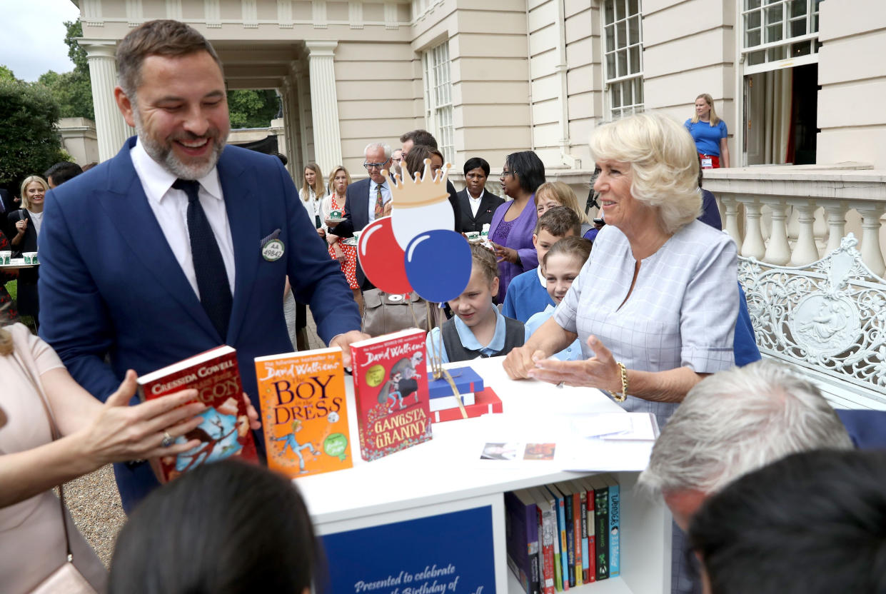 EMBARGOED TO 0001 THURSDAY MAY 21    File photo dated 11/7/2017 of comedian and author David Walliams during a tea party hosted by the Duchess of Cornwall to celebrate The Duchess's Bookshelves project. The pair spoke during their video chat to highlight the Queen's Commonwealth Essay Competition and they discussed how writing stories is perfect for passing the time in lockdown. PA Photo. Issue date: Thursday May 21, 2020. See PA story ROYAL Camilla. Photo credit should read: Chris Jackson/PA Wire                                                                        