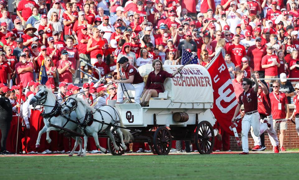 Oklahoma's Sooner Schooner rides on the field bore the team's game against South Dakota at Gaylord Family - Oklahoma Memorial Stadium.