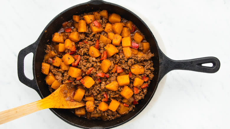 Butternut squash and beef in skillet