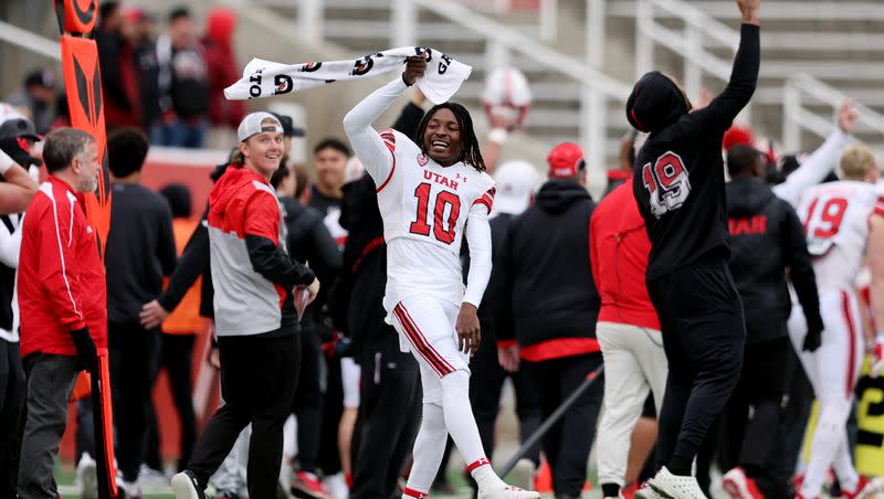 White’s Money Parks waves a towel after the defense took back an interception for a TD as The University of Utah football team plays in the 22 Forever Game at Rice Eccles Stadium in Salt Lake City on Saturday, April 22, 2023. the white team won 38-28 over red.