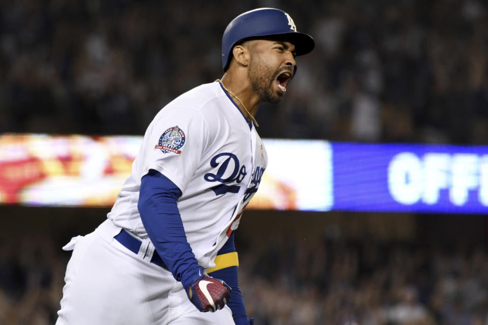 Los Angeles Dodgers' Matt Kemp reacts after hitting a three-run homer in the eighth inning of a baseball game against the Arizona Diamondbacks, Saturday, Sept. 1, 2018, in Los Angeles. (AP Photo/Michael Owen Baker)